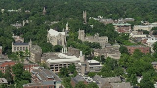 AX82_103 - 4.8K aerial stock footage of Princeton University Chapel and the Firestone Library in New Jersey