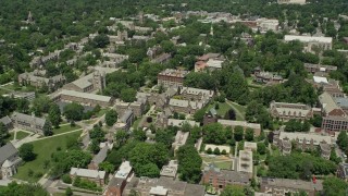 AX83_023 - 4.8K aerial stock footage flying by buildings at the Princeton University campus, New Jersey