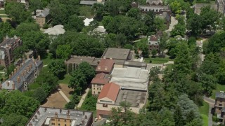 AX83_028 - 4.8K aerial stock footage tilting from Princeton University Art Museum to reveal campus buildings and the Chapel, New Jersey
