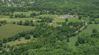 AX83_041 - 4.8K aerial stock footage of barns and farmland in Hillsborough Township, New Jersey