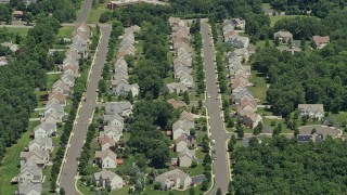 AX83_047 - 4.8K aerial stock footage approaching and flying over upscale homes in Somerset, New Jersey