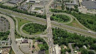 AX83_053 - 4.8K aerial stock footage of light traffic on a suburban highway, Piscataway Township, New Jersey