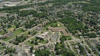 AX83_054E - 4.8K aerial stock footage of suburban neighborhoods around an elementary school, South Plainfield, New Jersey