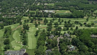 AX83_057 - 4.8K aerial stock footage of mansions and the Plainfield Country Club and golf course in Edison, New Jersey