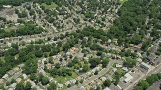 AX83_073 - 4.8K aerial stock footage flying over suburban homes in Union, New Jersey
