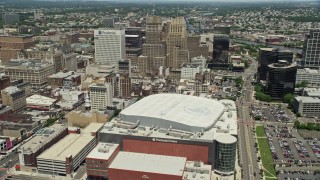 AX83_088 - 4.8K aerial stock footage of tall high-rises seen from Prudential Center in Downtown Newark, New Jersey