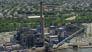 AX83_103E - 4.8K aerial stock footage of Hudson Generating Station in Jersey City, New Jersey