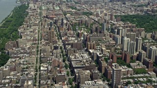 AX83_116E - 4.8K aerial stock footage of Upper West Side high-rises and wide avenues, New York City