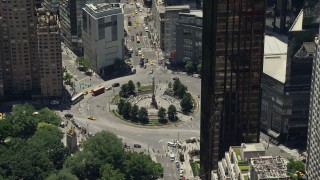 AX83_140 - 4.8K aerial stock footage approaching and tilting to Columbus Circle in Midtown Manhattan, New York City