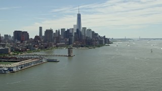 AX83_155 - 4.8K aerial stock footage tilting from the Hudson River to reveal the World Trade Center, Lower Manhattan skyline, New York City