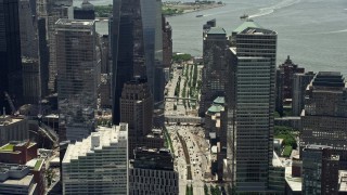 AX83_166 - 4.8K aerial stock footage of the base of One World Trade Center and streets, Lower Manhattan, New York City