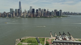 AX83_171 - 4.8K stock footage aerial video of Lower Manhattan skyline seen from Liberty State Park, New York City
