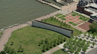 AX83_172 - 4.8K aerial stock footage orbiting Empty Sky Memorial in Liberty State Park, Jersey City, New Jersey