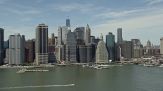 AX83_178 - 4.8K aerial stock footage of skyscrapers along the East River, Lower Manhattan, New York City