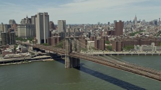 AX83_179 - 4.8K aerial stock footage of Brooklyn Bridge in Lower Manhattan, New York City