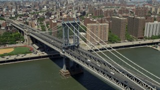 AX83_180 - 4.8K aerial stock footage of Manhattan Bridge in Lower Manhattan, New York City