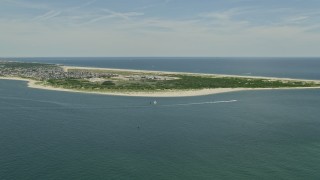 AX83_222 - 4.8K aerial stock footage approaching the beach at Breezy Point, Queens, New York