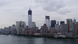 AX84_015 - 4K aerial stock footage Flying by World Trade Center, Lower Manhattan, New York, New York
