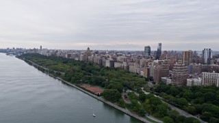 AX84_030E - 4K aerial stock footage passing by Riverside Park on the Upper West Side, New York City
