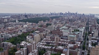 AX84_037 - 4K aerial stock footage of Central Park, seen from Morningside Heights, New York City