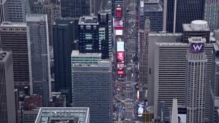 AX84_049 - 4K aerial stock footage of 7th Avenue, Times Square, Midtown Manhattan, New York, New York