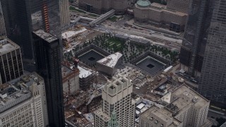AX84_085 - 4K aerial stock footage Flying by World Trade Center Memorial, Lower Manhattan, New York, New York