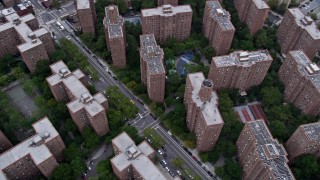AX84_133 - Aerial stock footage of 4K Aerial Video Flying over Stuyvesant Town, revealing FDR Drive, New York, New York