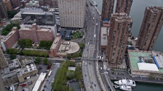 AX84_134 - Aerial stock footage of 4K Aerial Video Flying over Kips Bay, revealing East River, New York, New York