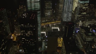 AX85_016 - 4K aerial stock footage of World Trade Center Memorial, World Trade Center, New York, New York, night