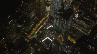 AX85_028 - 4K aerial stock footage of World Trade Center Memorial, Lower Manhattan, New York, New York, night