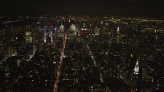 AX85_034 - 4K aerial stock footage Approaching Midtown Manhattan, New York, New York, night