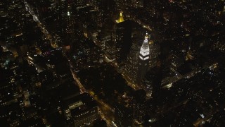 AX85_035 - 4K aerial stock footage Metropolitan Life Insurance Company Tower, Midtown Manhattan, New York, night