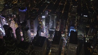 AX85_041 - 4K aerial stock footage Times Square, skyscrapers, Midtown Manhattan, New York, New York, night