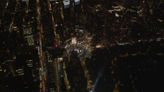 AX85_042 - 4K aerial stock footage Approach Columbus Circle, Midtown Manhattan, New York, New York, night