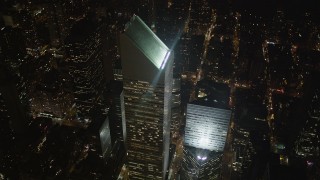 AX85_066 - 4K aerial stock footage Flying by Citigroup Center, Midtown Manhattan, New York, New York, night