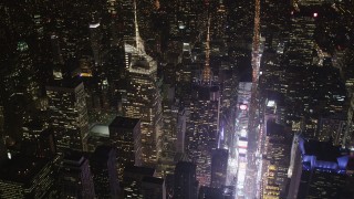 AX85_073 - 4K aerial stock footage Bank of America Tower, Times Square, Midtown Manhattan, New York, night