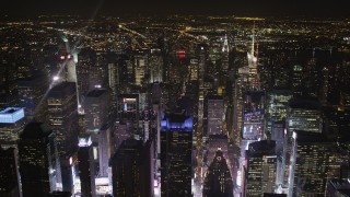 AX85_075 - 4K aerial stock footage Times Square skyscrapers, Midtown Manhattan, New York, New York, night