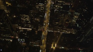 AX85_082 - 4K aerial stock footage Bird's eye view flying over Avenue of the Americas, New York, New York, night