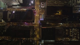 AX85_084 - 4K aerial stock footage Bird's eye view following Avenue of the Americas, New York, New York, night