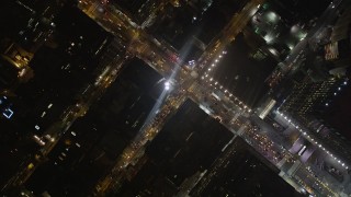 AX85_088 - 4K aerial stock footage Bird's eye view orbiting Chelsea streets, New York, New York, night