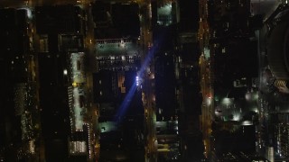 AX85_089 - 4K aerial stock footage Bird's eye view flying over Chelsea streets, New York, New York, night