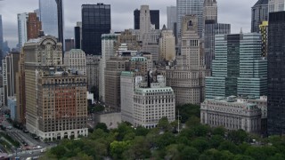 AX86_004 - 4K stock footage aerial video tilt from the Hudson River to reveal Battery Park and Lower Manhattan, New York City
