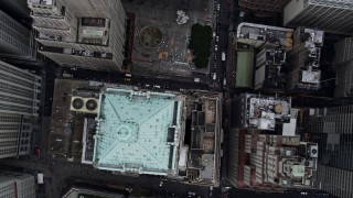 AX86_005 - 4K aerial stock footage of tilting to a bird's eye view of 40 Wall Street, Lower Manhattan, New York City