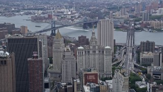 AX86_013 - 4K aerial stock footage tilt to reveal and approach the Manhattan Municipal Building, Lower Manhattan, New York City