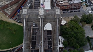 AX86_018 - 4K aerial stock footage of a bird's eye view of traffic on the Brooklyn Bridge into Brooklyn, New York City