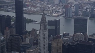 AX86_038 - 4K aerial stock footage of approaching the Chrysler Building in Midtown Manhattan, New York City