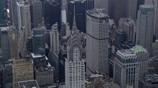 AX86_046 - 4K aerial stock footage flyby the Chrysler Building in Midtown Manhattan, New York City