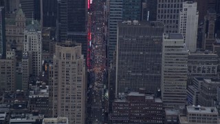 AX86_048 - 4K aerial stock footage of heavy traffic on 7th Avenue through Midtown Manhattan, New York City