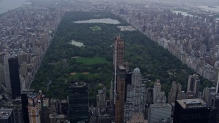 AX86_049 - 4K aerial stock footage of approaching famous Central Park, New York City