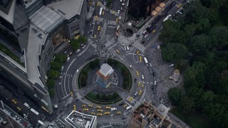 AX86_051 - 4K aerial stock footage of a bird's eye view of Columbus Circle in Midtown, New York City